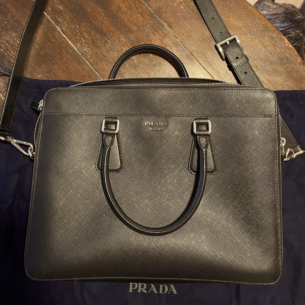 Prada two compartment Saffiano Leather briefcase. Holds up to 15” laptop.